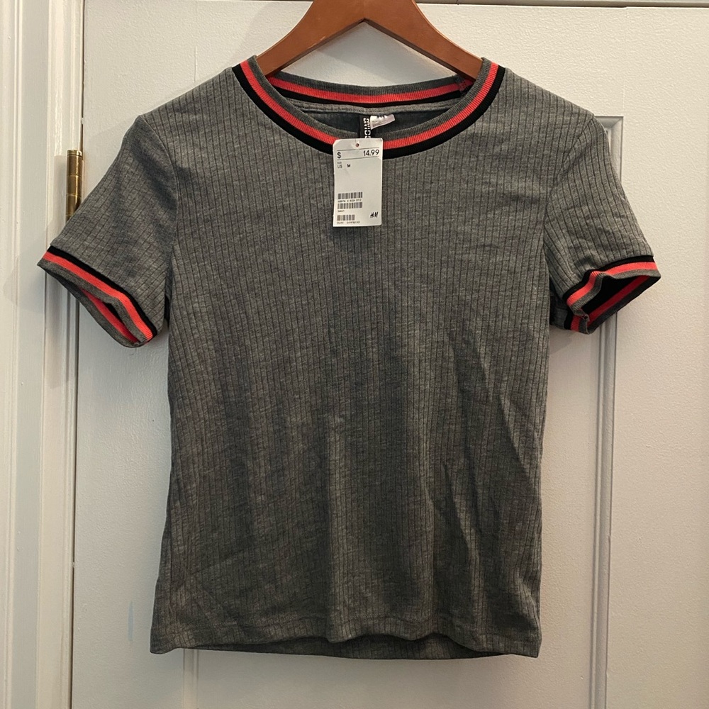 Gray T-shirt with black and coral trim from H&M